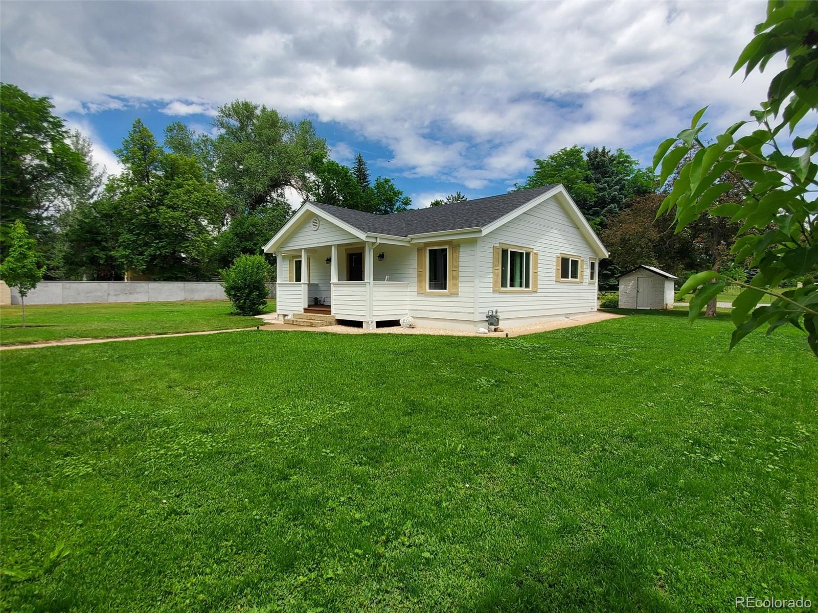 900 Cherryvale Road Boulder, CO 80303 - Photo 21 of 30 a front view of house with yard and green space