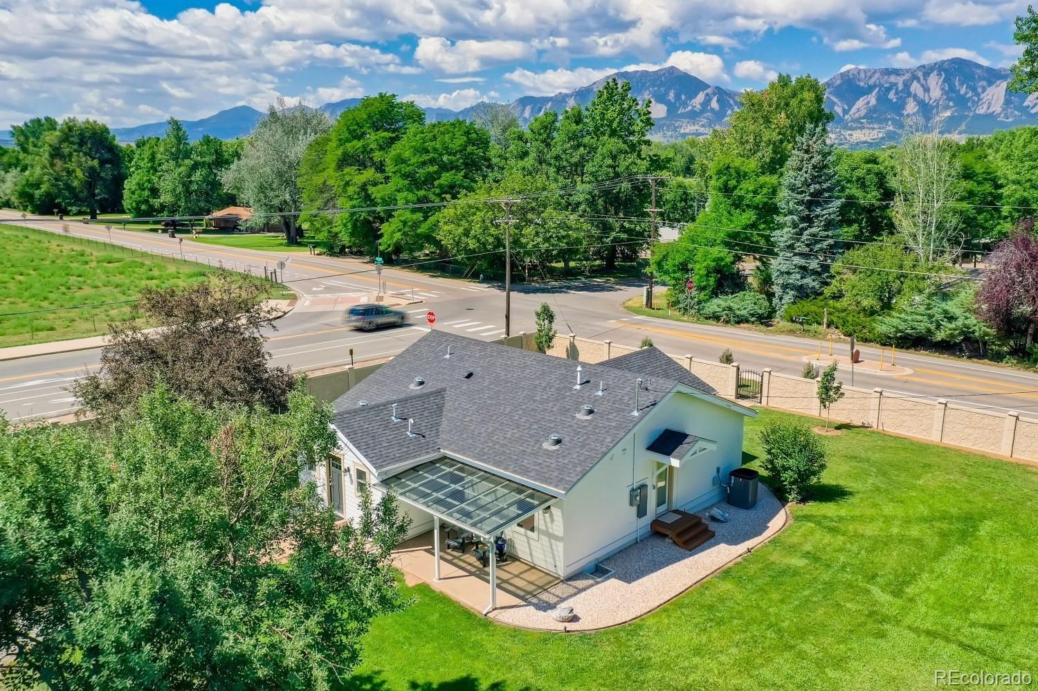 900 Cherryvale Road Boulder, CO 80303 - Photo 24 of 30 an aerial view of a house with a big yard