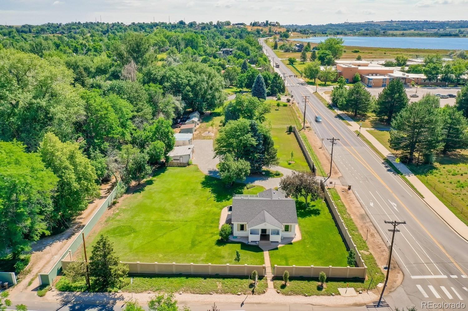 900 Cherryvale Road Boulder, CO 80303 - Photo 26 of 30 an aerial view of houses with a swimming pool