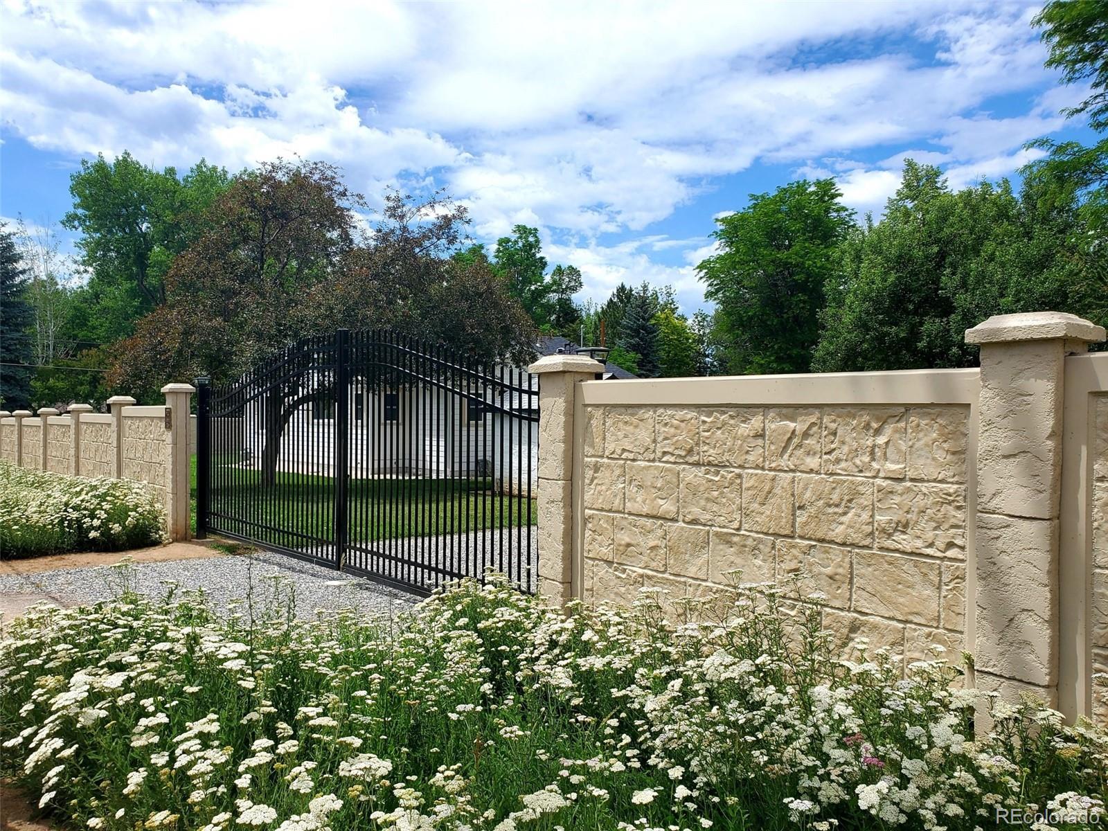 900 Cherryvale Road Boulder, CO 80303 - Photo 29 of 30 a view of a fence in front of a house