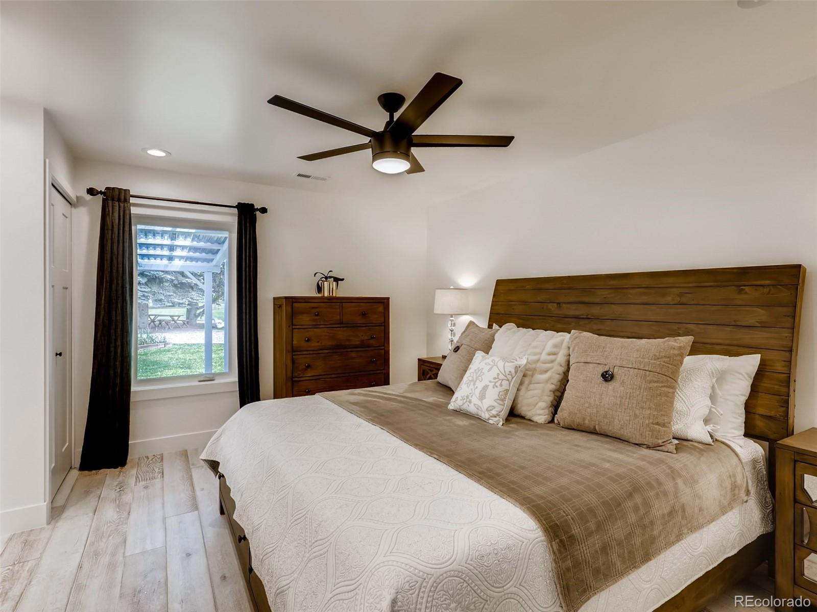 900 Cherryvale Road Boulder, CO 80303 - Photo 10 of 30 a bedroom with a bed and a dresser