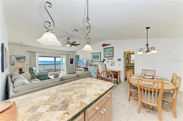 a spacious bedroom with a bed and a couch