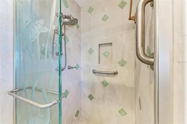 a bedroom with two large bed and a large window