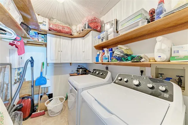 a balcony with a table and chairs