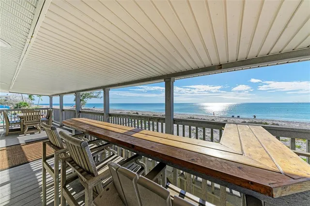a view of a balcony with furniture