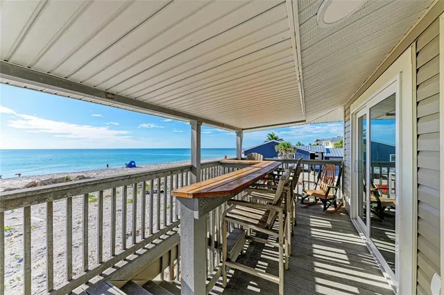 a view of a chairs on the deck