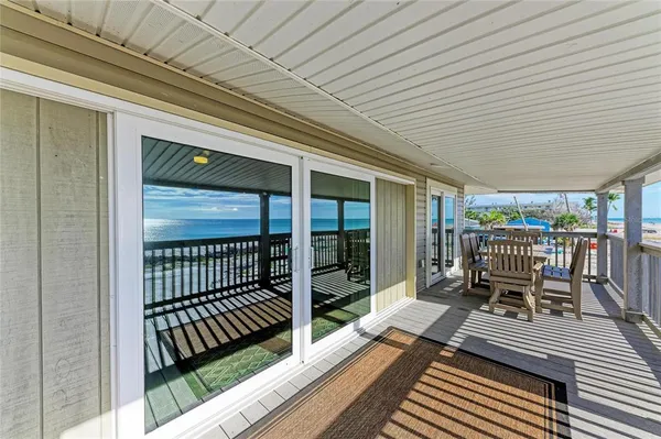 a view of a room that has a large window