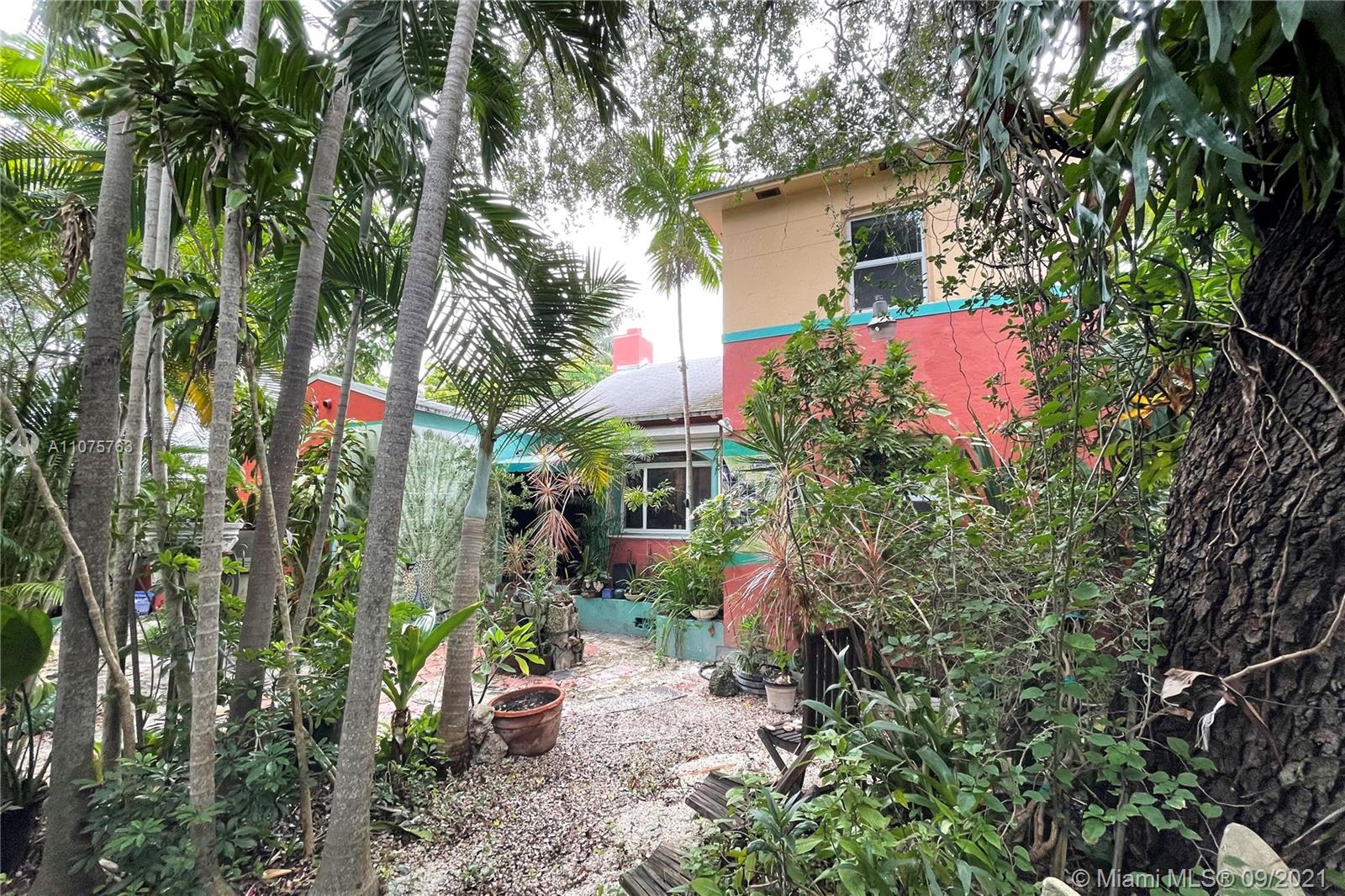 435 Northeast 77th Street Road Miami, FL 33138 - Photo 8 of 14 view of a house with a tree