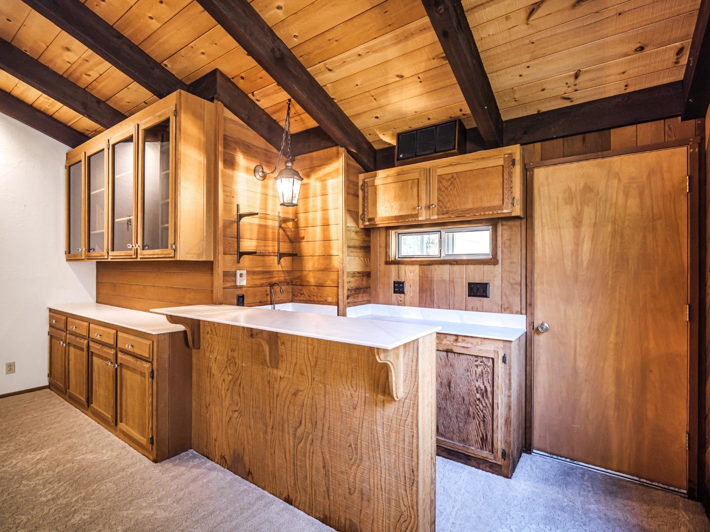 135 McKay Road Aptos, CA 95003 - Photo 12 of 57 a kitchen with a sink and large window