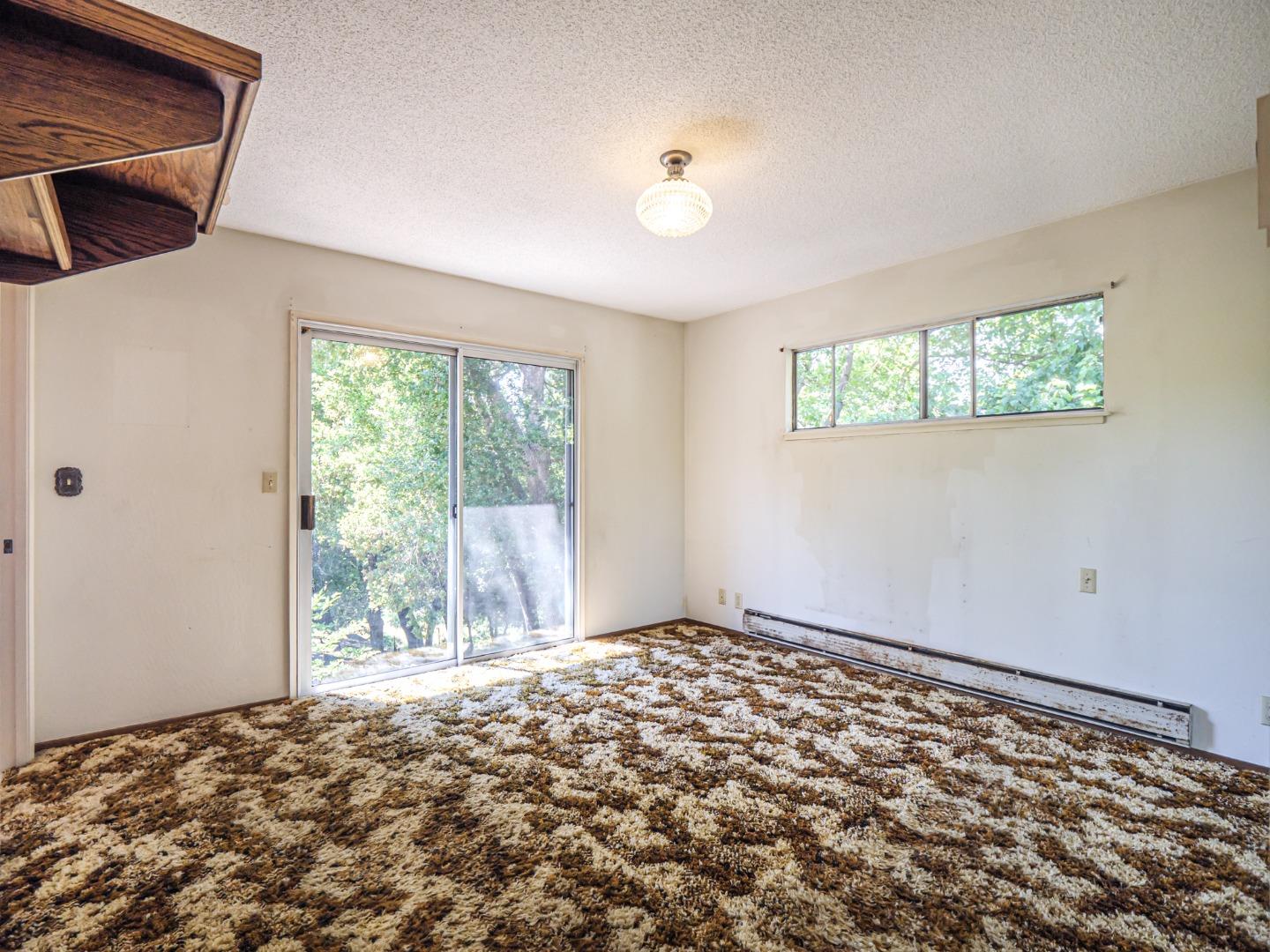 135 McKay Road Aptos, CA 95003 - Photo 25 of 57 a view of an empty room and window