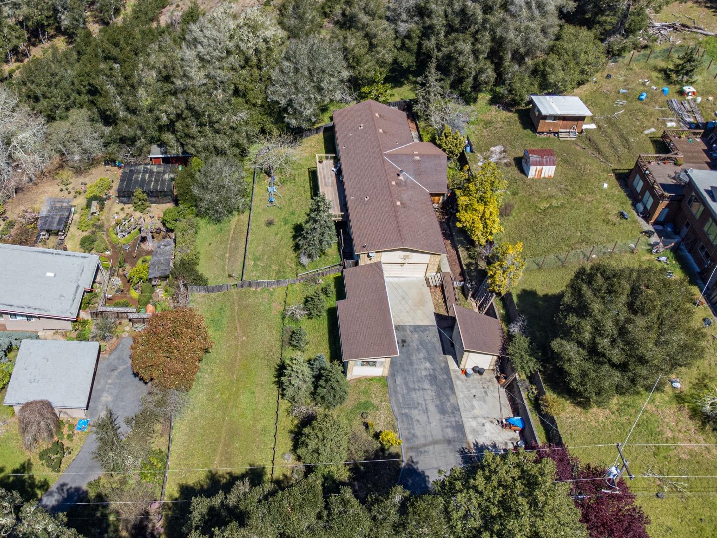 135 McKay Road Aptos, CA 95003 - Photo 3 of 57 an aerial view of a house with outdoor space