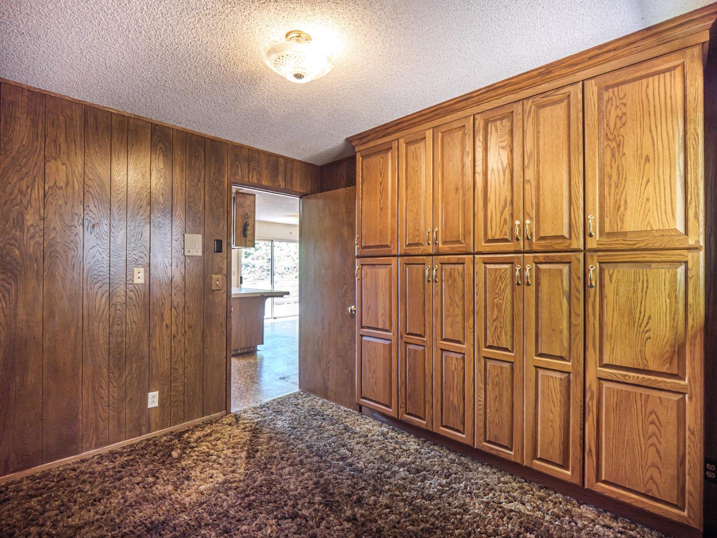 135 McKay Road Aptos, CA 95003 - Photo 37 of 57 a view of a closet with wooden floor