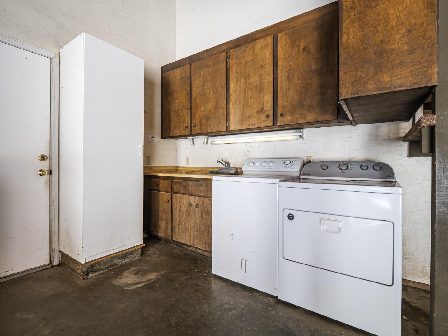 135 McKay Road Aptos, CA 95003 - Photo 39 of 57 a utility room with dryer and washer
