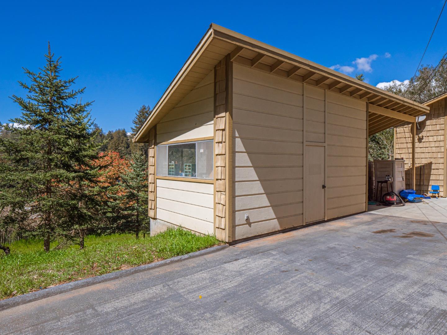 135 McKay Road Aptos, CA 95003 - Photo 50 of 57 a view of a house with a yard