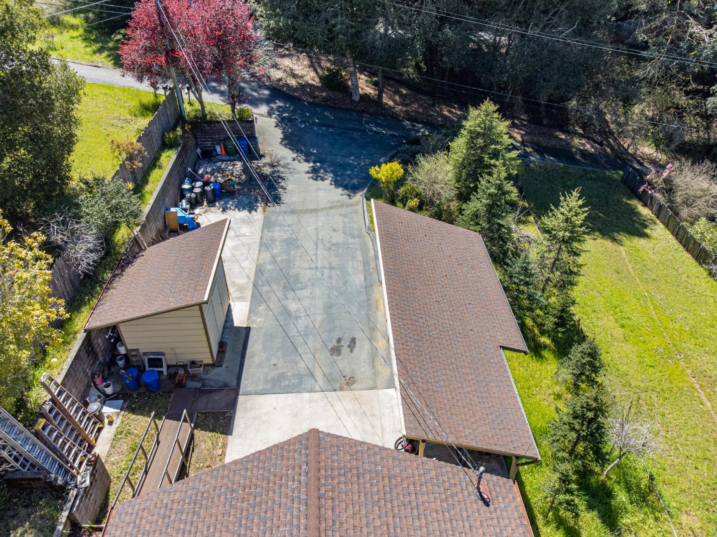 135 McKay Road Aptos, CA 95003 - Photo 5 of 57 an aerial view of a house with garden space and street view
