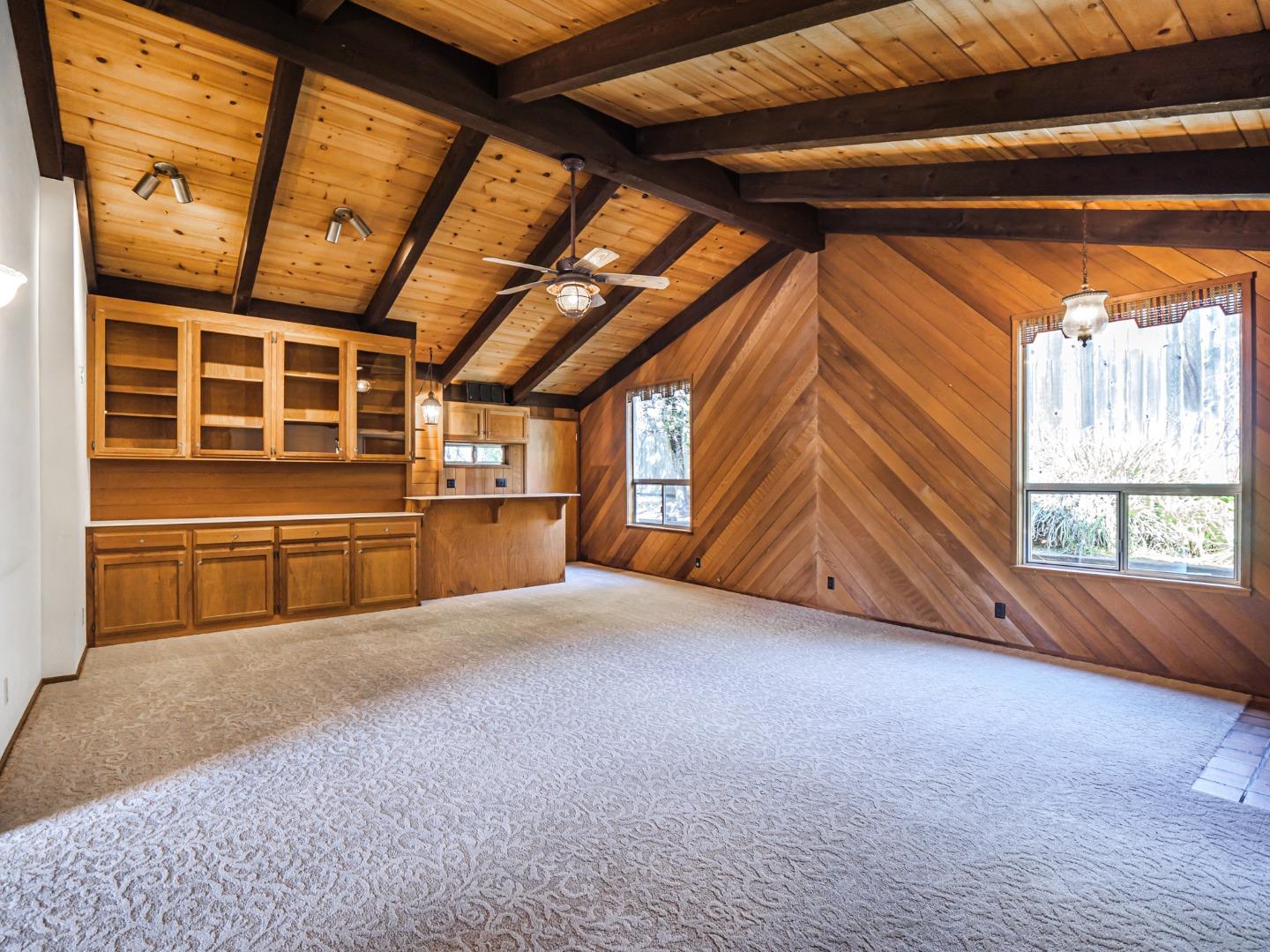 135 McKay Road Aptos, CA 95003 - Photo 8 of 57 a view of an empty room with a window