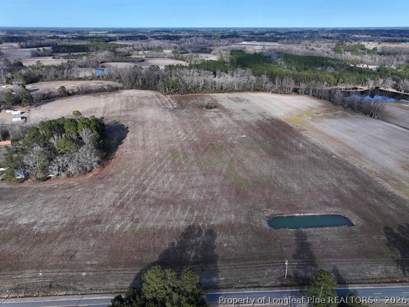 Raynham Road Fairmont, NC 28340 - Photo 4 of 9 an aerial view of a house with a yard