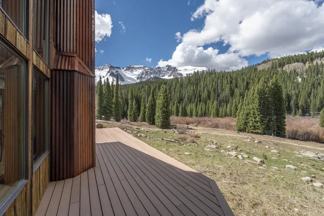a view of a backyard of the house