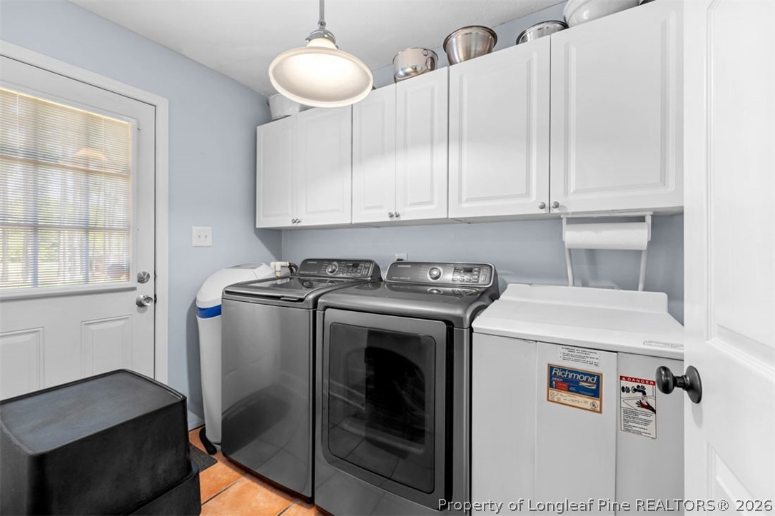 310 Canady Street Fayetteville, NC 28306 - Photo 12 of 50 a utility room with dryer and washer