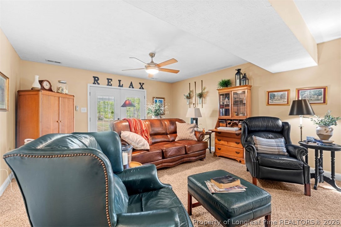 310 Canady Street Fayetteville, NC 28306 - Photo 14 of 50 a living room with furniture and a window