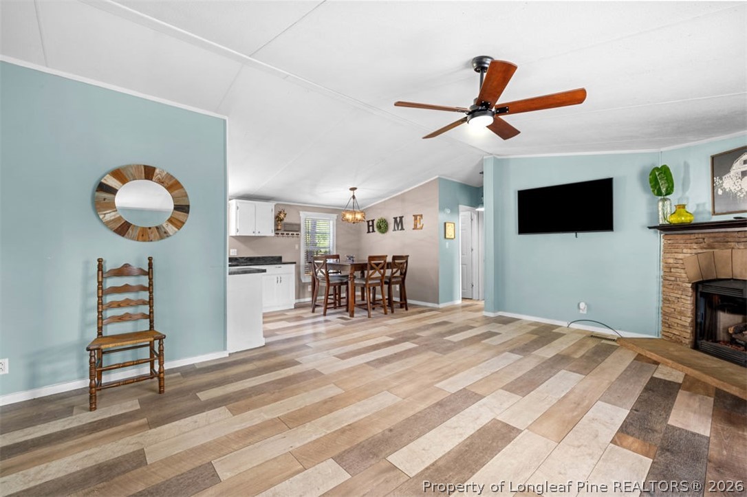 310 Canady Street Fayetteville, NC 28306 - Photo 28 of 50 a view of a livingroom with furniture and a ceiling fan