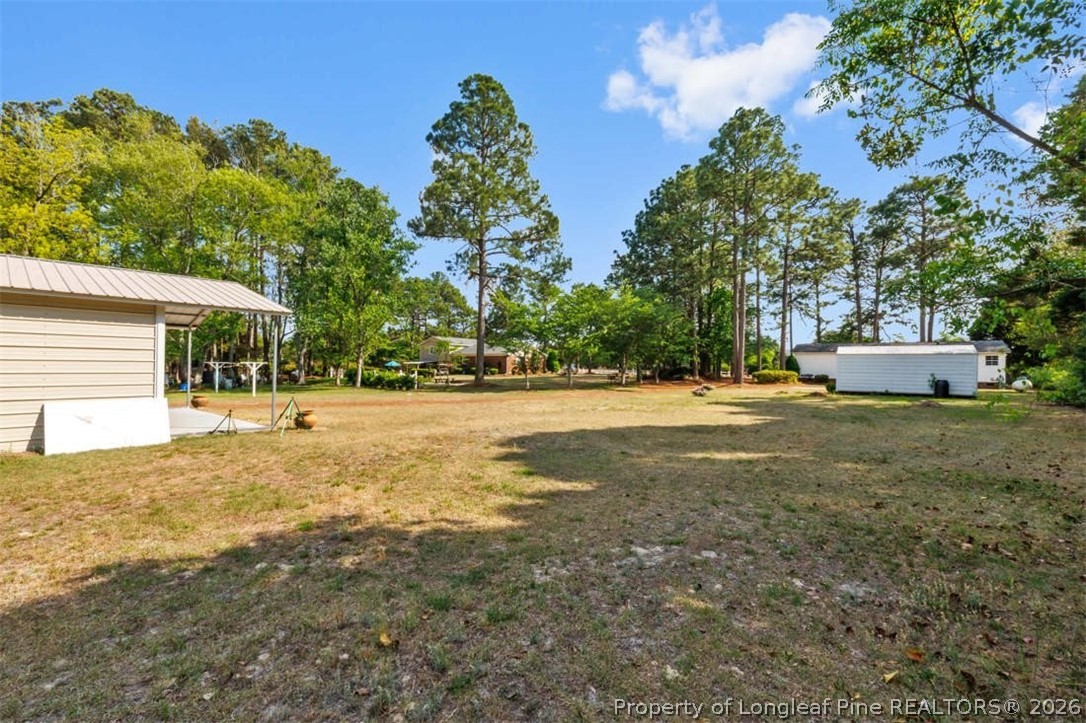 310 Canady Street Fayetteville, NC 28306 - Photo 48 of 50 a view of backyard with outdoor space