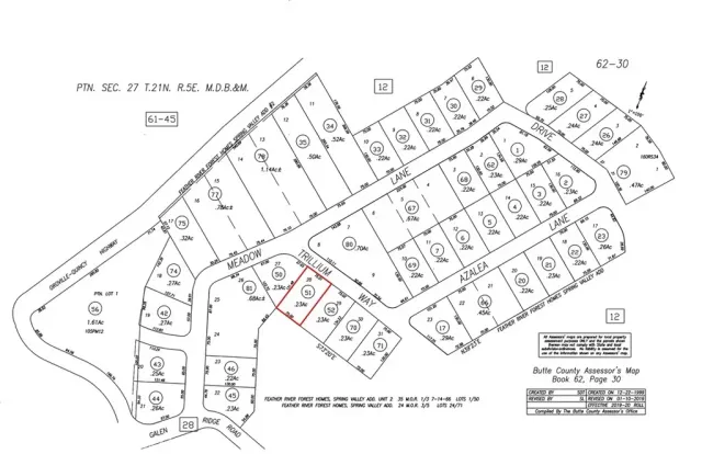 a black and white photo of a book and a white table