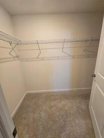 a view of a room with racks on the wall