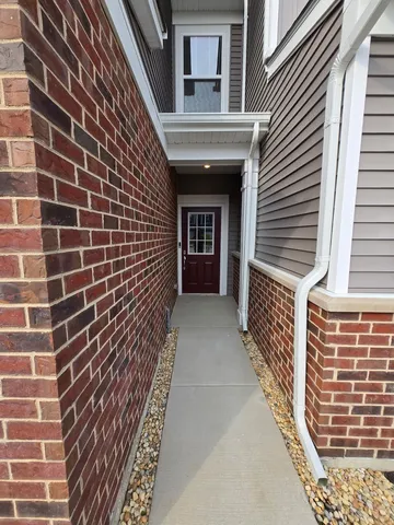 a view of a brick buildings with entryway