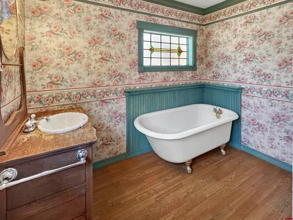a bathroom with a sink and a bathtub