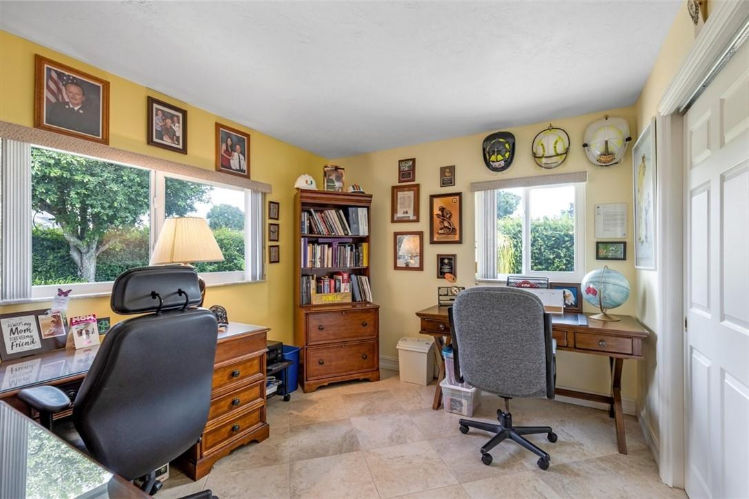 4625 Appalachian Street Boca Raton, FL 33428 - Photo 21 of 24 a view of a workspace with furniture and a window