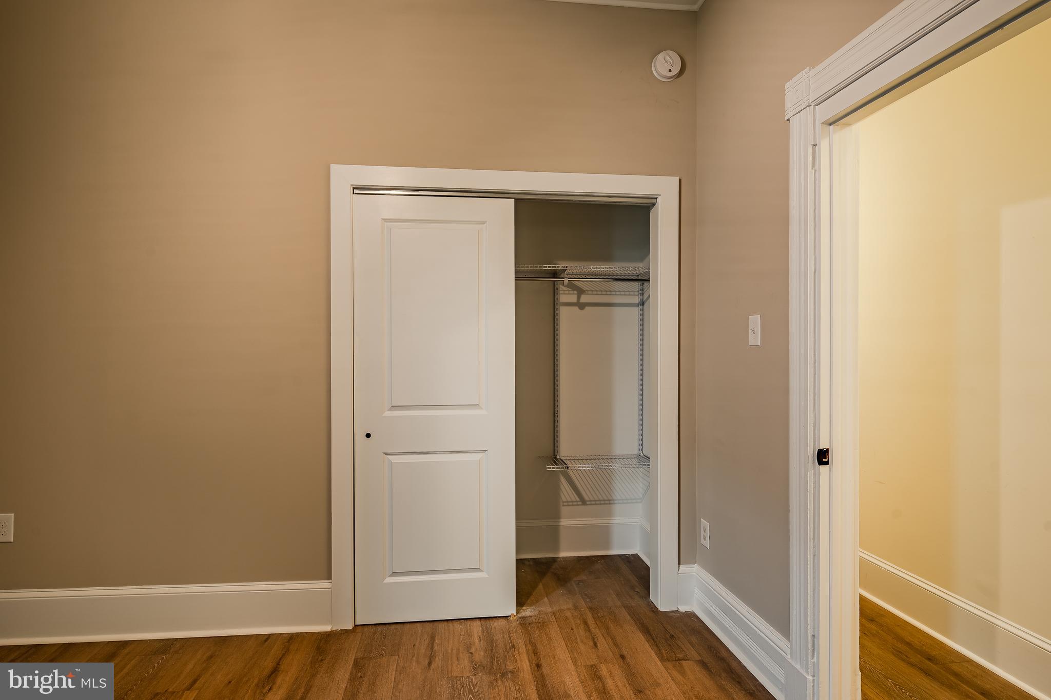 144 Gay Street, Unit 1 Phoenixville, PA 19460 - Photo 15 of 22 a view of a hallway with wooden floor