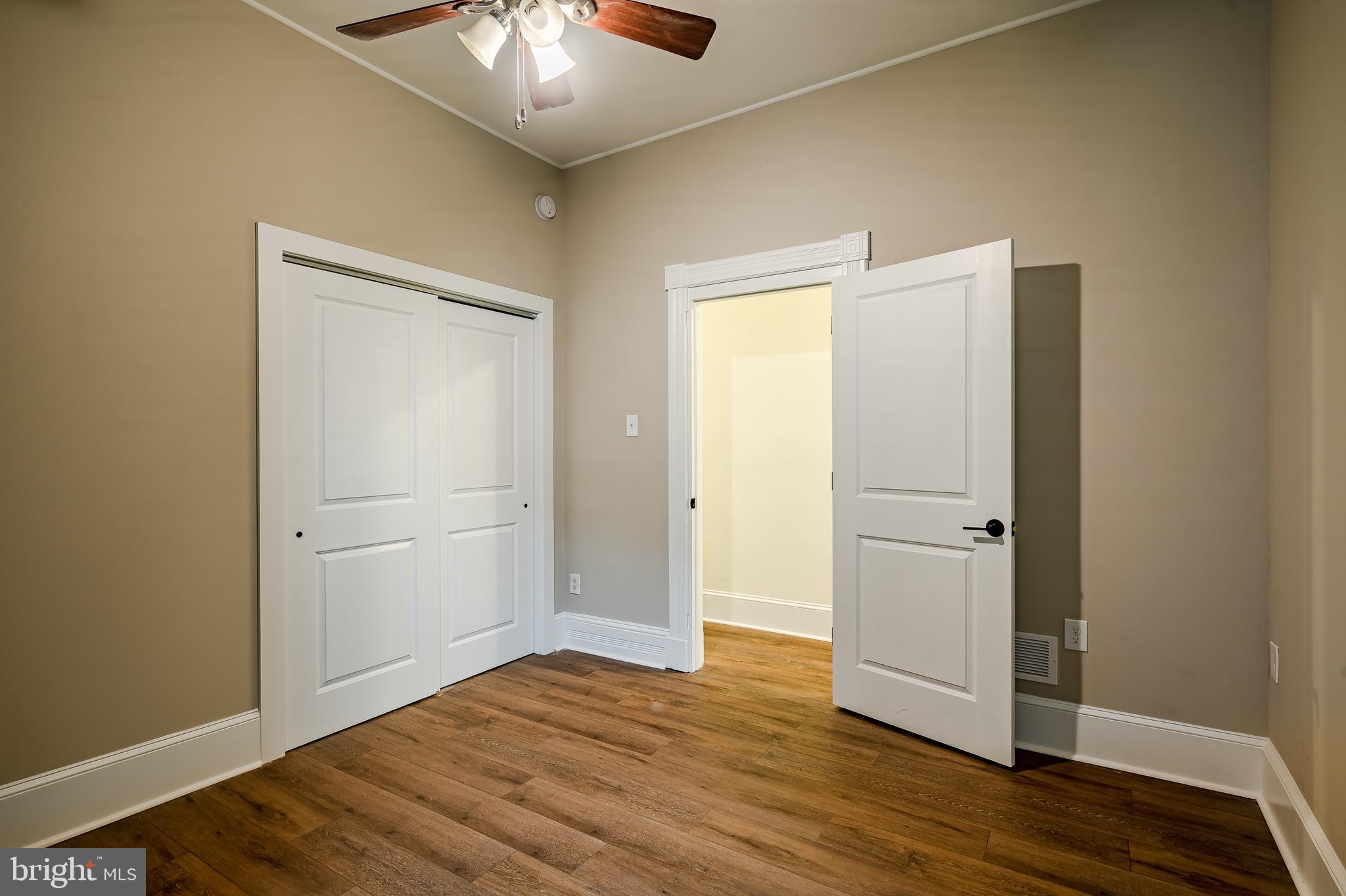 144 Gay Street, Unit 1 Phoenixville, PA 19460 - Photo 16 of 22 a view of a livingroom with wooden floor and closet