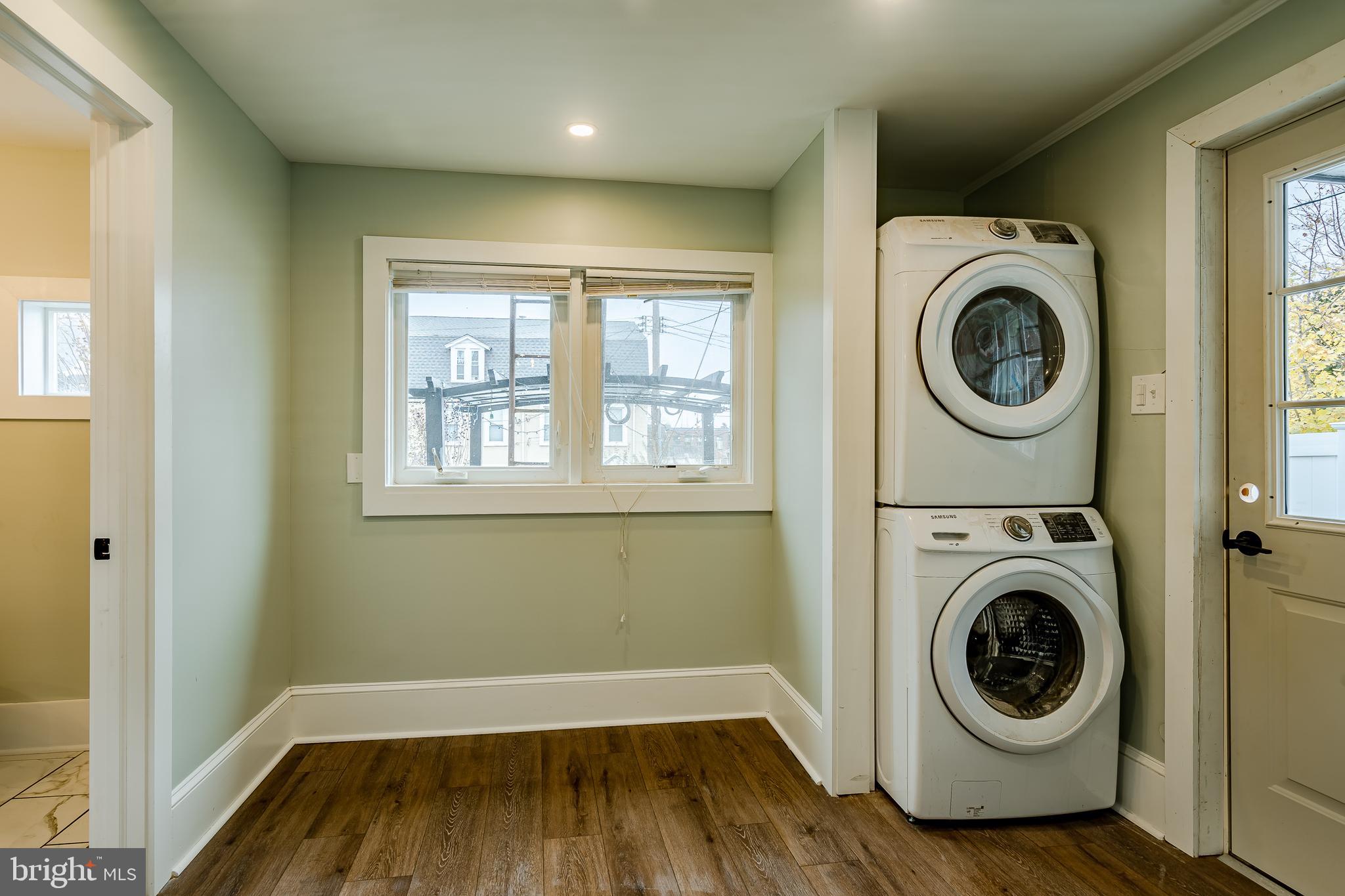 144 Gay Street, Unit 1 Phoenixville, PA 19460 - Photo 17 of 22 a view of a hallway with washer and dryer