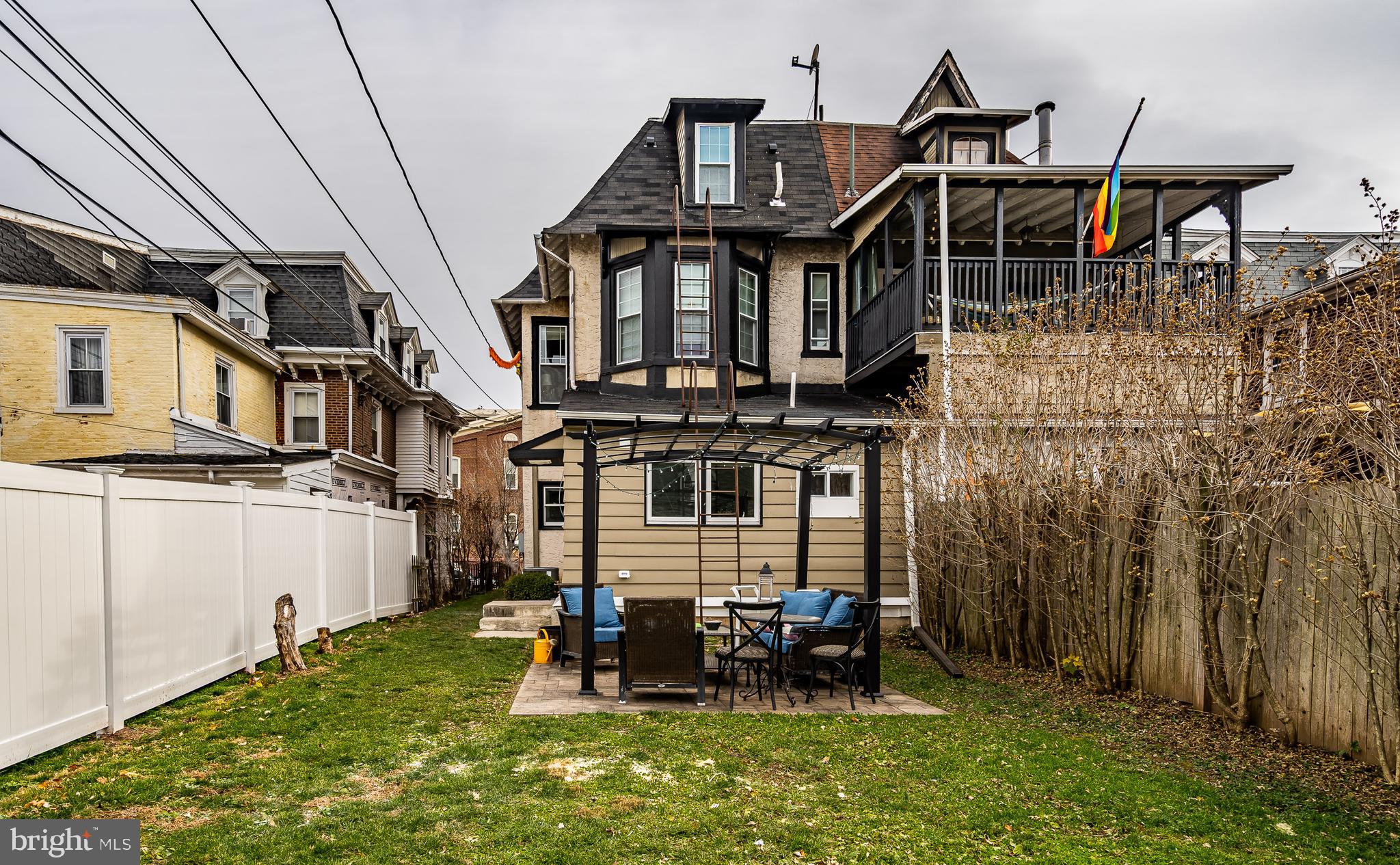 144 Gay Street, Unit 1 Phoenixville, PA 19460 - Photo 20 of 22 a view of a house with backyard and porch
