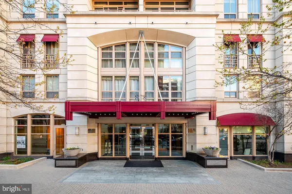 a view of a cafe with sitting area