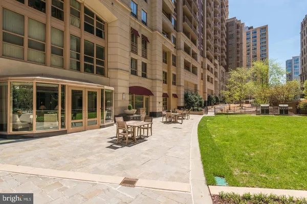 a view of a building with sitting area