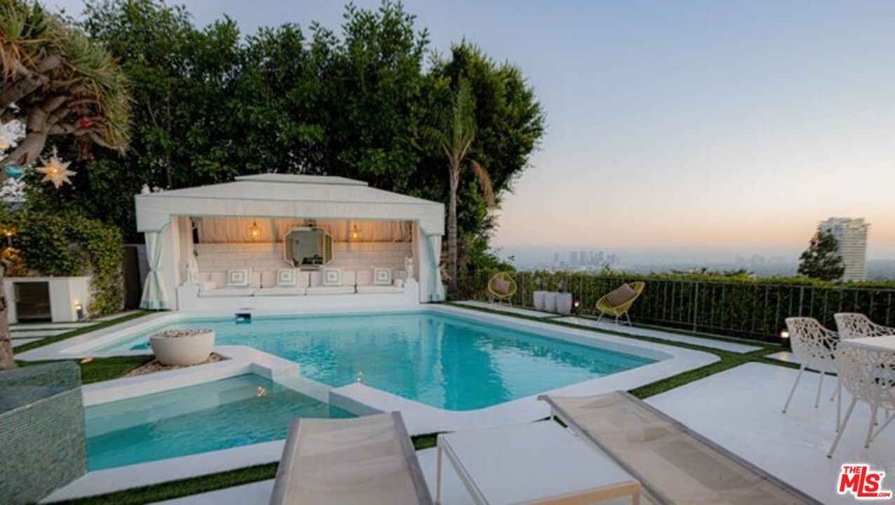 1425 Devlin Drive Los Angeles, CA 90069 - Photo 1 of 15 swimming pool view with a seating space