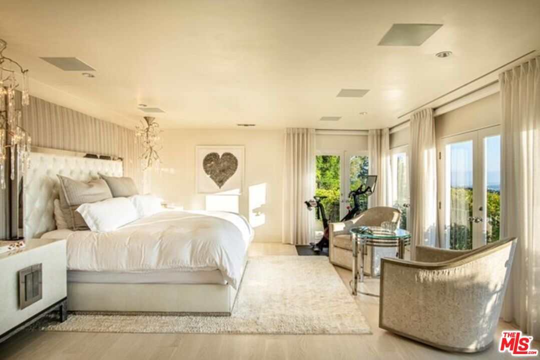 1425 Devlin Drive Los Angeles, CA 90069 - Photo 7 of 15 a living room with furniture and a large window