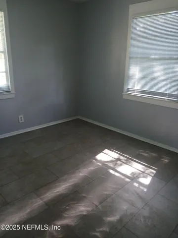 a view of empty room with window