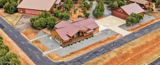 an aerial view of a house with a garden