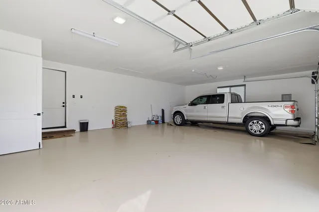 a front view of a building with parking