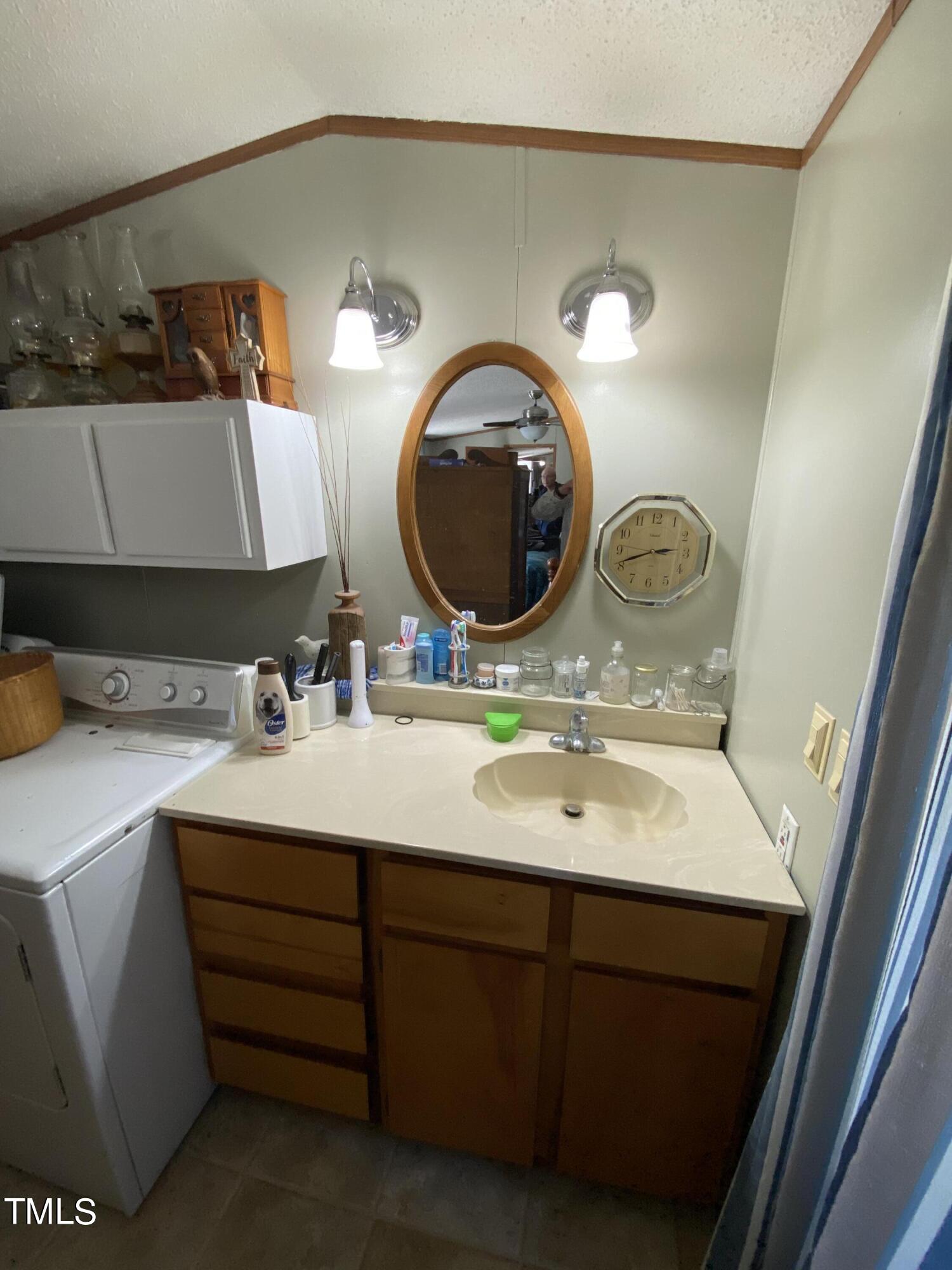 2637 Propus Wilkinson Road Bullock, NC 27507 - Photo 33 of 46 Laundry and sink area in master bedroom.
