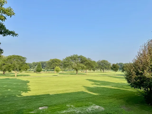 a view of a city with a lake