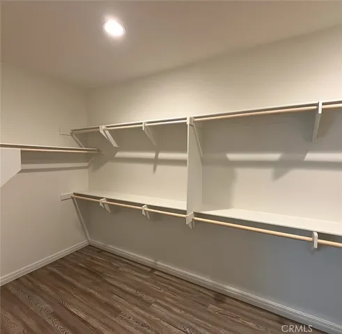 a view of an empty walk in closet