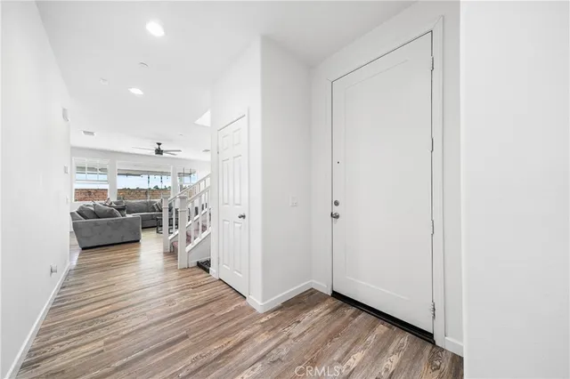 a view of a livingroom with wooden floor