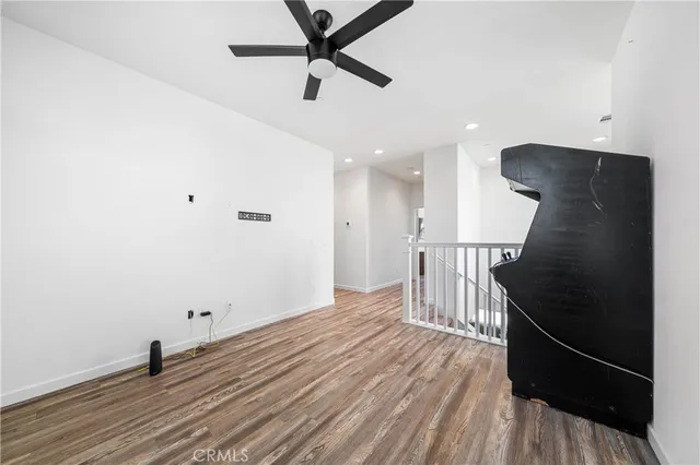 a building outdoor space with patio furniture and potted plants