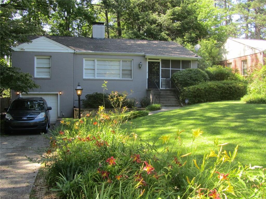 2264 Eastway Road Decatur, GA 30033 - Photo 1 of 1 a front view of a house with garden