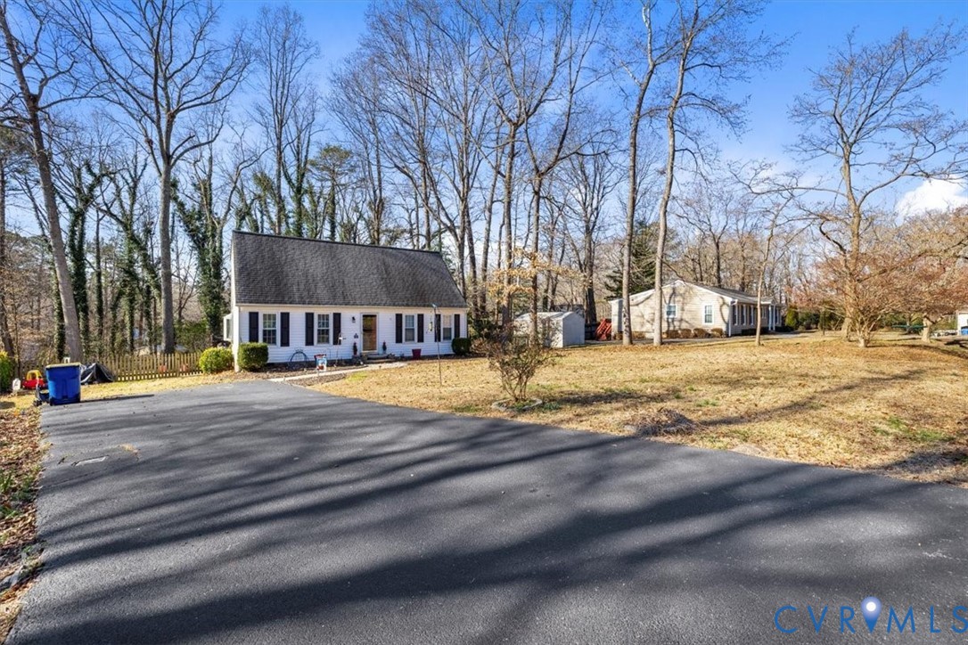 12505 Mandolin Drive Midlothian, VA 23113 - Photo 16 of 26 a view of swimming pool with trees