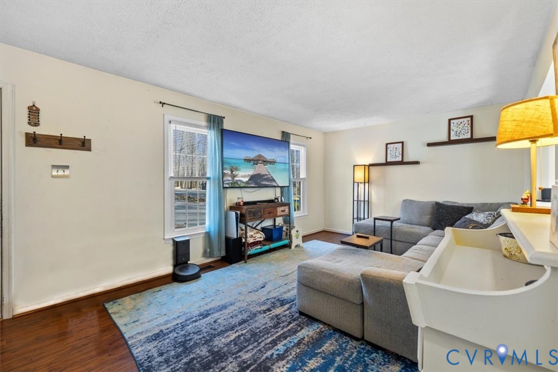 12505 Mandolin Drive Midlothian, VA 23113 - Photo 4 of 26 a living room with furniture and a fireplace